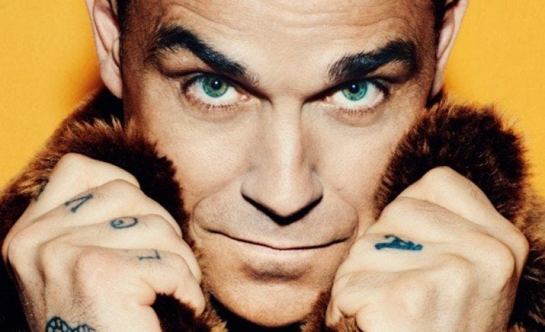 Robbie Williams Backs Oasis In Ticket Pricing Drama